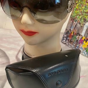 Bvlgari authentic sunglasses with crystal rock logo on the side